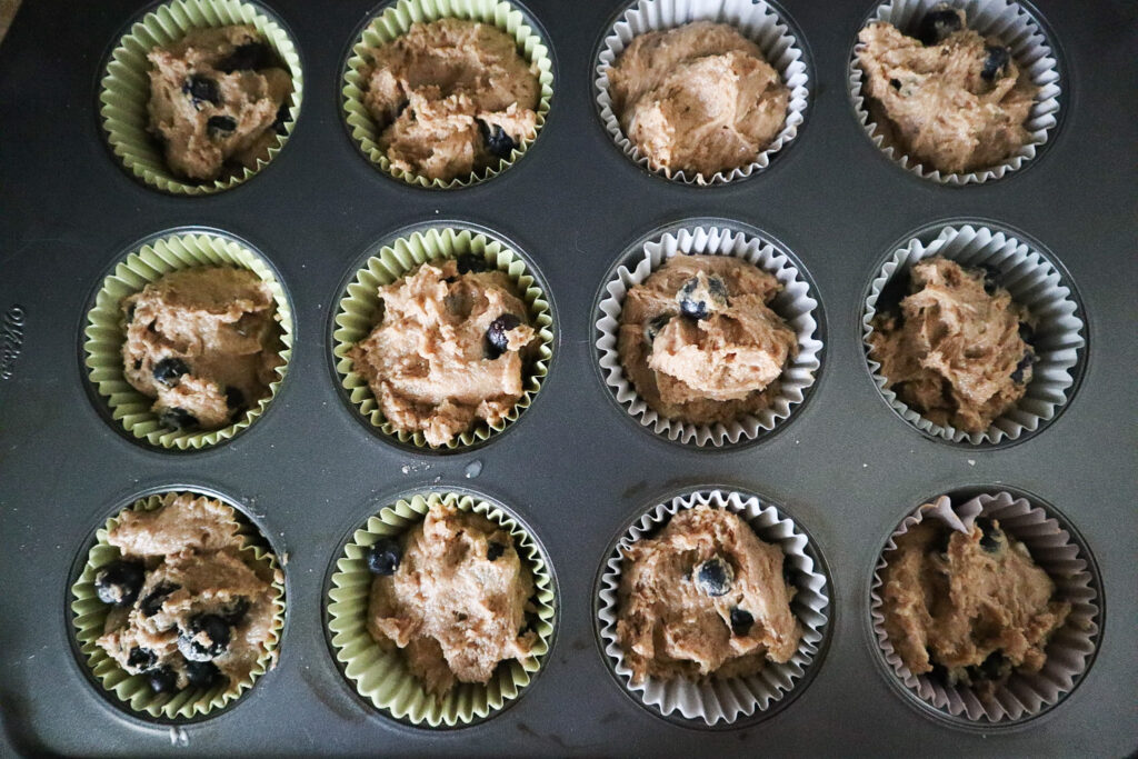 batter in a muffin tin 